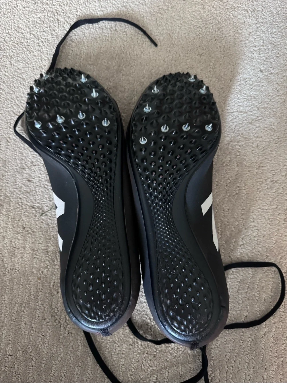 New Balance Black metal track cleats with White Logo 11sz